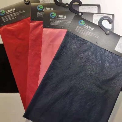 Prenda impermeable de nylon llana grabada en relieve Ripstop de la tela 35gsm de Taslon
