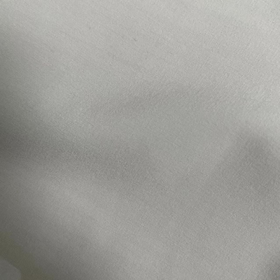 83.3%Polyester 17,7%Spandex 150±5GSM Tejido de agujero de spandex de 4 vías
